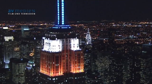 Photo of top floors of Empire State Building at Night