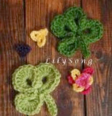 http://www.craftsy.com/pattern/crocheting/accessory/free-clover-crochet-embellishments/7892