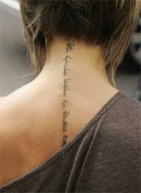 Victoria Beckham Neck Tattoo Design