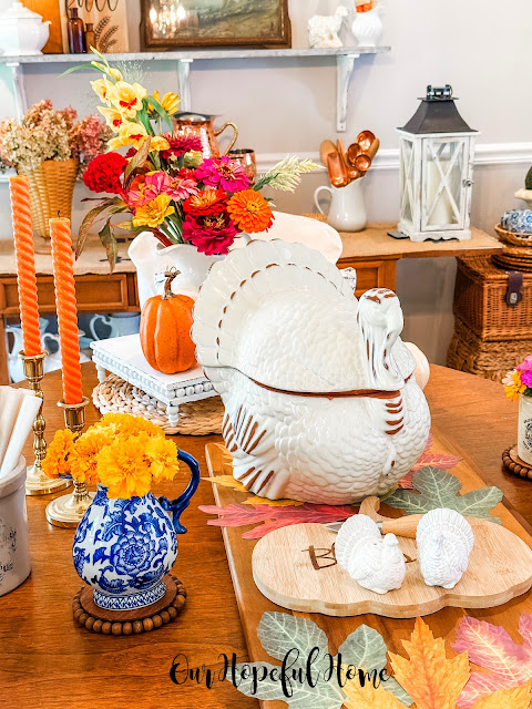 Thanksgiving table with large white turkey tureen.