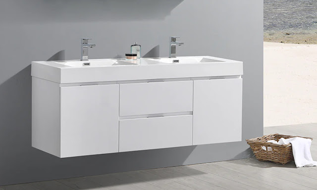 Valencia bathroom vanity in a white against a gray wall with modern styling.