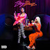 Dreezy puts the Chi on her back.