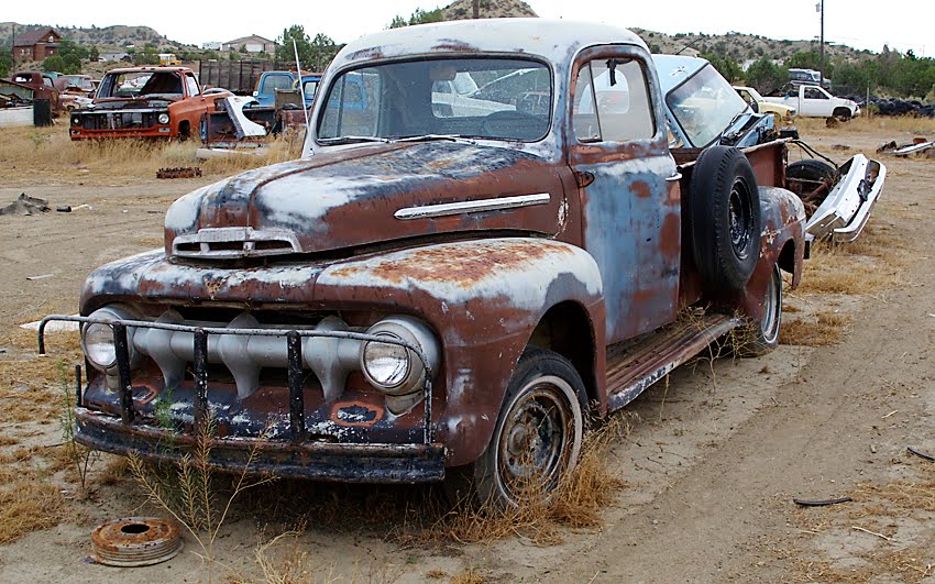 Sand sun and slowrusting classic trucks can be found in the desert 