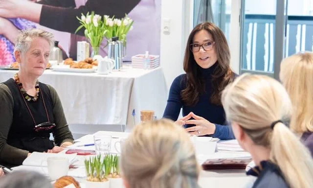 Crown Princess Mary wore a navy blue cashmere turtleneck sweater by Zara, and black trousers by Imperial Fashion