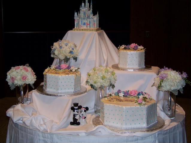 Four tier Cinderella Castle Wedding Cake with the tiers separated over