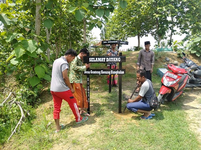 SALAM PERPISAHAN KKN 03 STAMIDIYA DENGAN PEMASANGAN PELANGISME DESA GENTENG