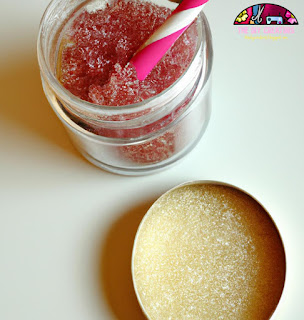 Sugar lip scrub image: A jar filled with sugar lip scrub mixture and a brush for application.
