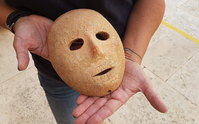 old rock mask was lately unveiled past times the State of Israel Antiquities Authority For You Information - 9,000-year-old rock mask unveiled inwards Israel