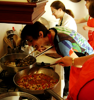 Cooking with tomatoes on on of our cooking holidays