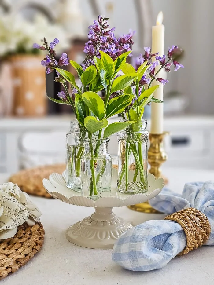 spice jar vase centerpiece, flowers, greenery