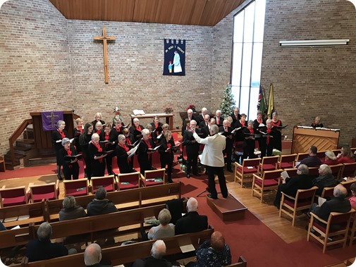 Musical Director Phil Houghton  conducts The Wistaston Singers
