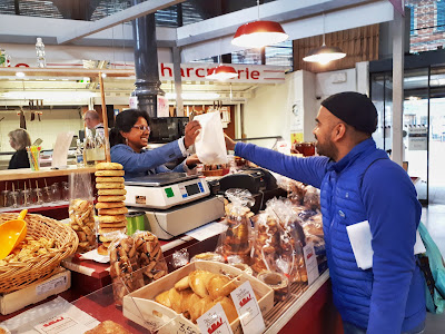 Budget Traveller Kash shopping at the Albi Food Market