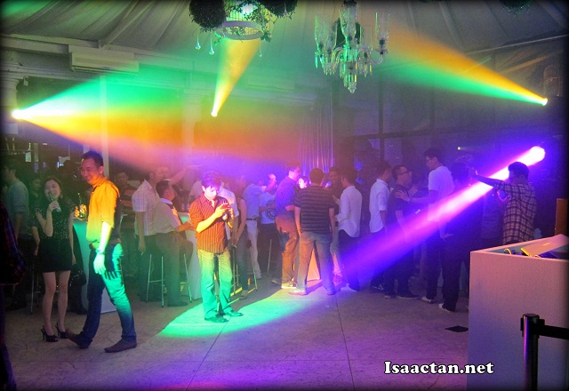 The dance floor at the beginning of the night with all the coloured beams