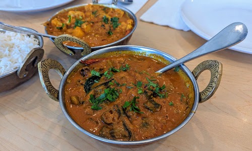 Bhindi (front) and aloo gobi (back) masalas