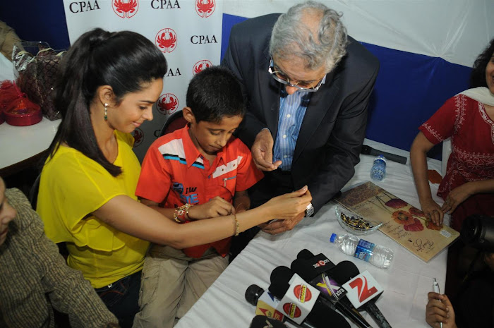 mallika sherawat visits cancer patients aid ociation. cute stills