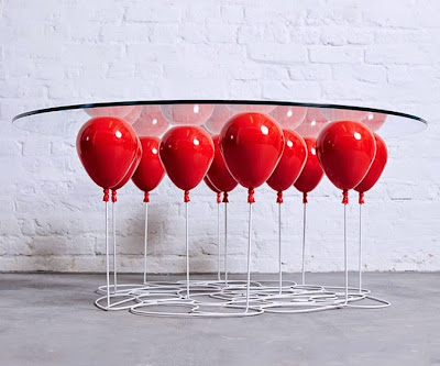 Design very creative glass table with red balloons