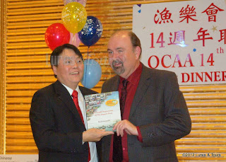 image Raymond Zee, OCAA, presents award to Jack Summers Radioworld Canada 