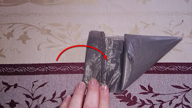 You may need to fold the handle back approximately 2.5 cm (1 inch)