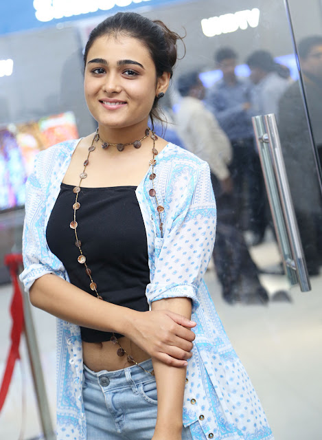 Shalini Pandey exudes elegance in her latest airport pics, a stunning display of beauty and style.