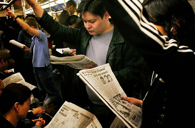 Commuters on a bus to work