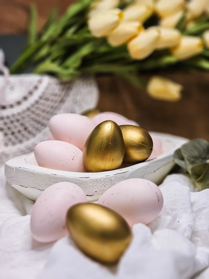 pink, gold eggs, dough bowl, doily, tulips