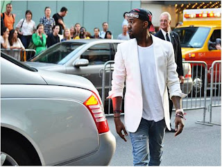 Kanye West with his snakeskin snapback