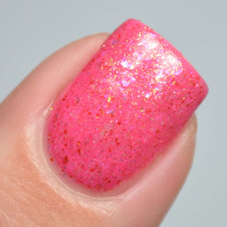 coral crelly nail polish with flakies