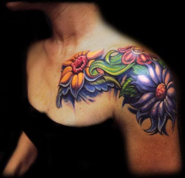 Yellow green and purple flowers shoulder tattoo
