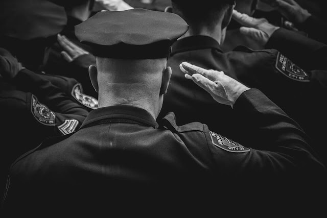 police black and white salute