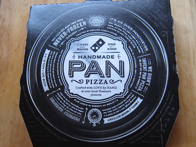 The pizza box for Domino's Handmade Pan Pizza.