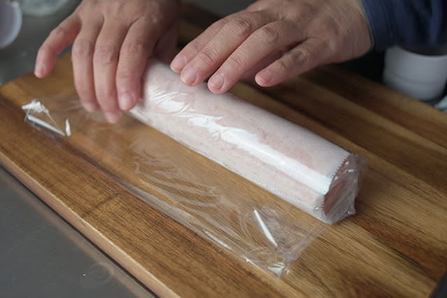 Roll for the second time using cling film.