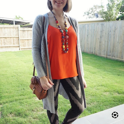 awayfromtheblue Instagram | wool maxi cardigan printed jeans and orange cami rebecca minkoff mab camera bag