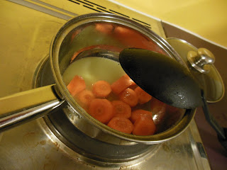 Carrots cooking in pot