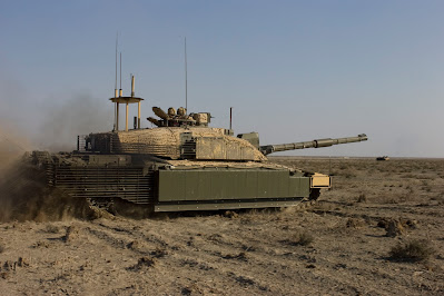 A Royal Scots Dragoon Guards Challenger 2 Main Battle Tank prepares to fire its main gun during a training exercise near Basra in Iraq on the 17th of November 2008