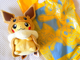 A plushie of Pikachu dressed as Eevee, from the Pokemon Center