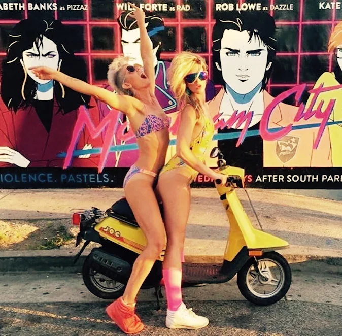 These two girls have time-traveled from mid-eighties LA to the future (2015) on their 1985 Yamaha Jog scooter time machine.