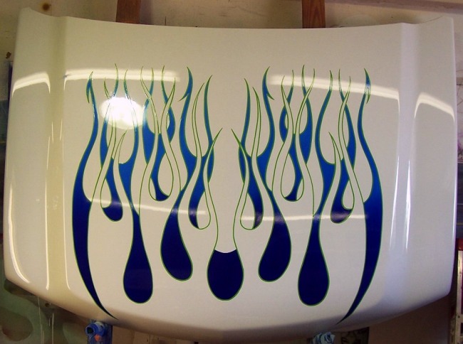 Hood Wearing A Blue Flame WIth Technique Of Airbrush Art