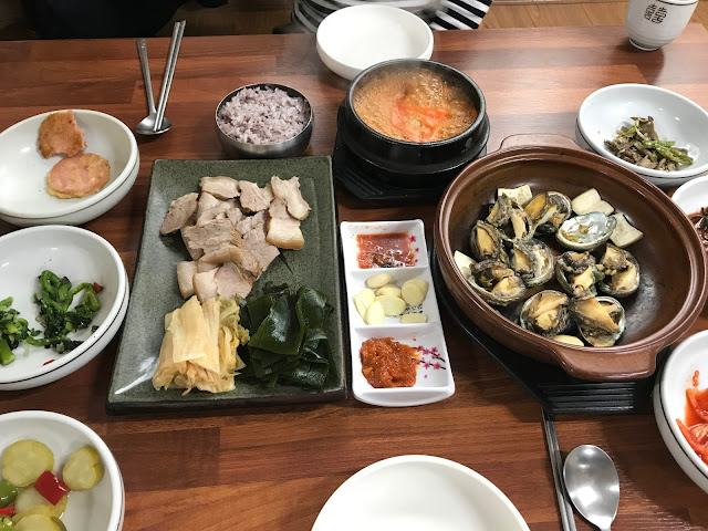 Jeju island Steamed Abalone and Steamed Pork Slices with Ripened Kimchi and Kelp Yongdamgol