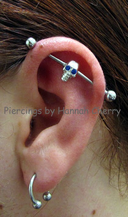 Here is a photo of an industrial piercing I did about 5 months ago.