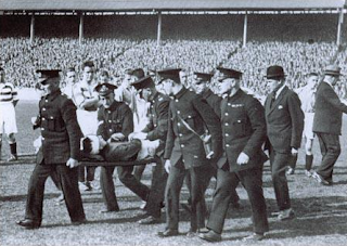 John Thomson is stretchered off