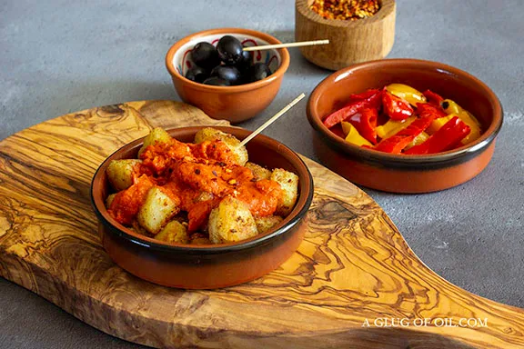 Papas bravas in a tapas dish.