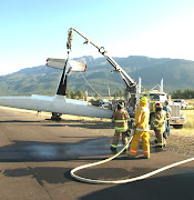 VOLUNTEERS RESPOND WHEN PRIVATE PLANE FLIPS ON JOSEPH AIRPORT RUNWAY