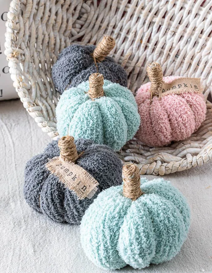 green, gray, pink fluffy sock pumpkins, jute stems