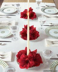 red amaryllis white candles Christmas table