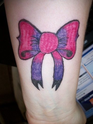 ribbon bow tattoo. Bow tattoos have gained