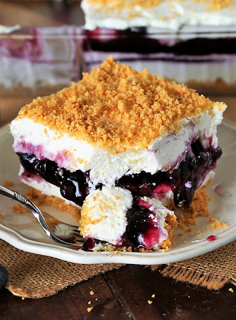  With two fluffy layers sandwiching a layer of blueberry pie filling No-Bake Blueberry Yum Yum