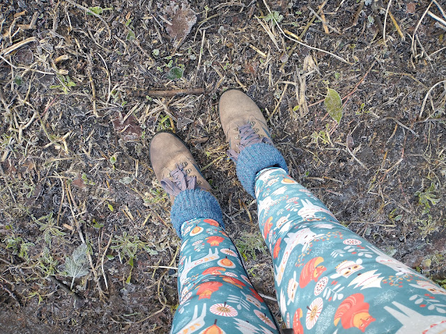 Cheerful leggings, walking boots and mud