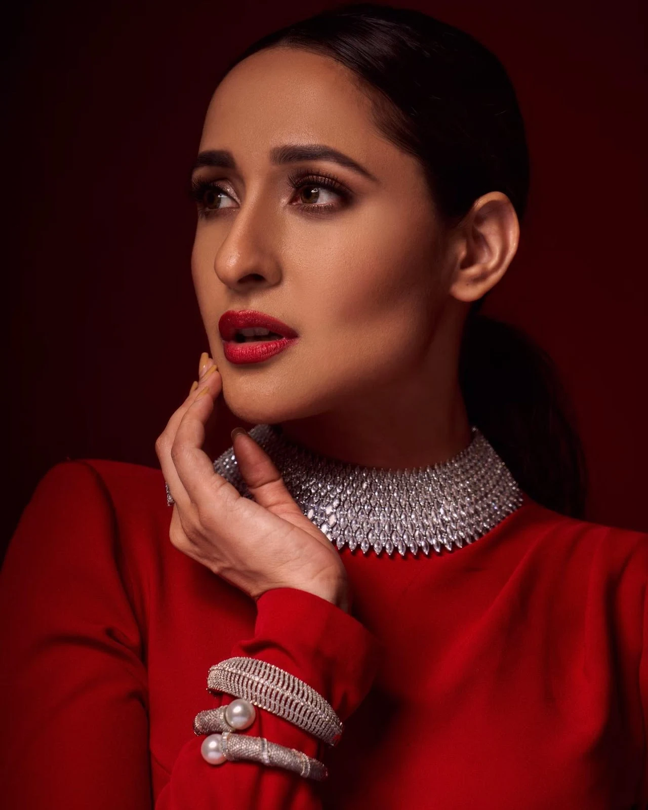 Pragya Jaiswal sexy face red outfit hot actress