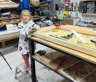 Helping daddy in the workshop