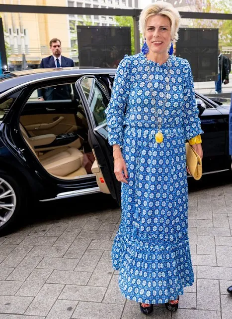 Princess Laurentien wore a blue print midi dress by Essentiel Antwerp and platform sandals by Essentiel Antwerp